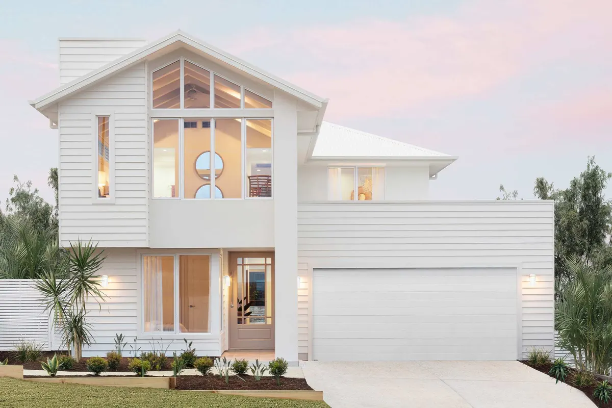 Modern coastal double-storey home with a full-height glass gable
